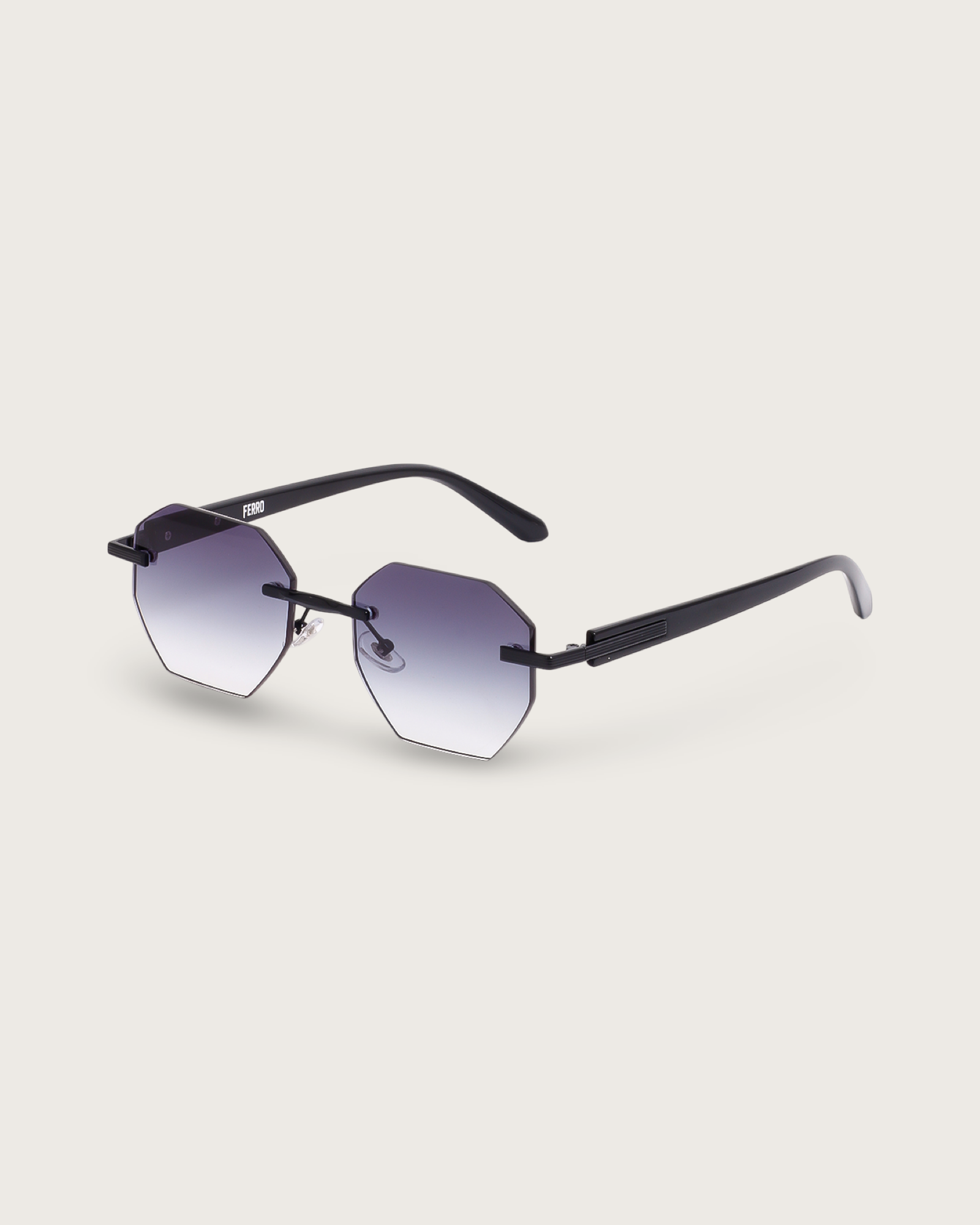 Vanta IV sunglasses featuring a hexagonal rimless design and charcoal-grey gradient lenses for stylish, all-day wear.