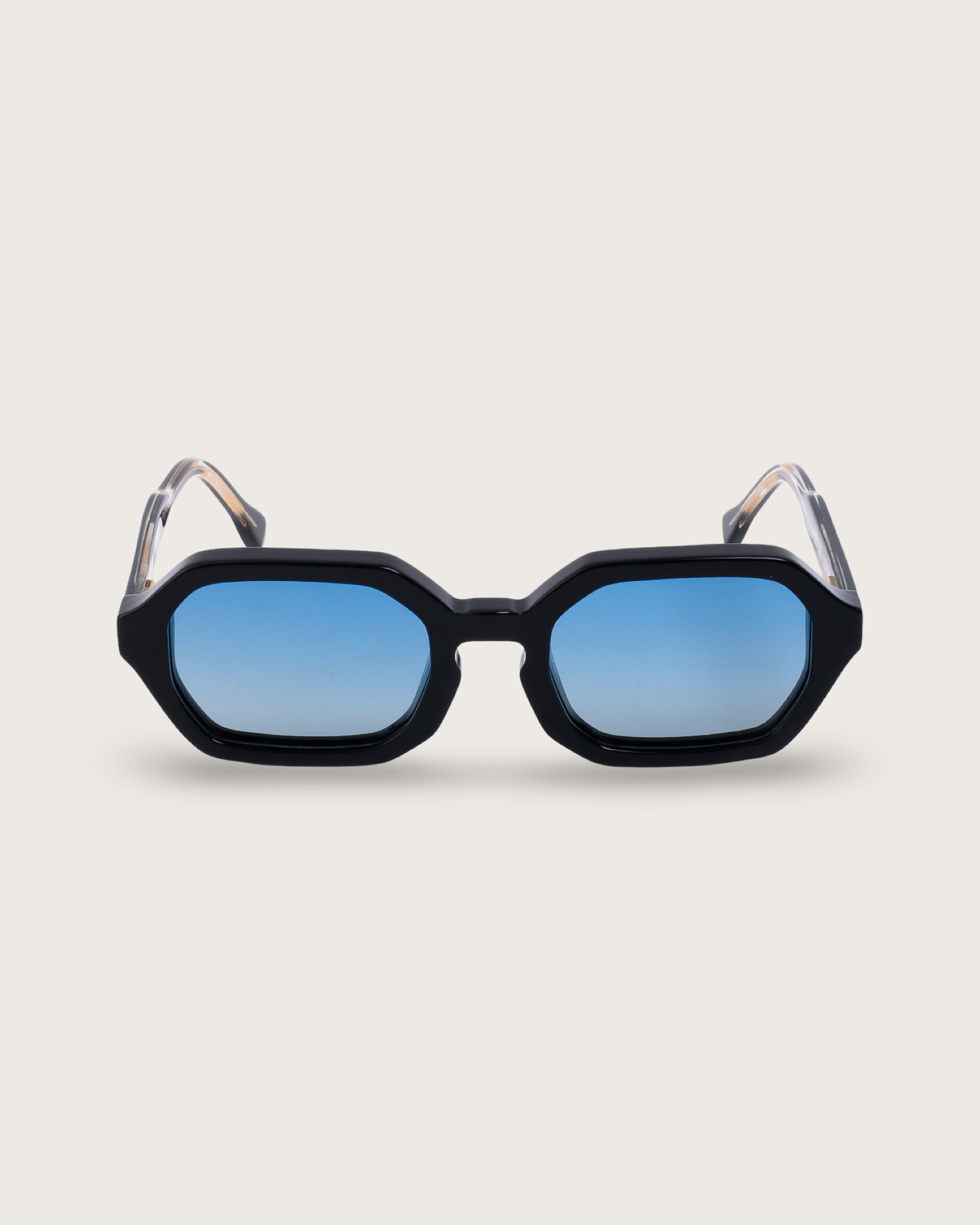 FERRO Midnight Blue Gradient sunglasses with bold octagonal black acetate frame and blue gradient lenses.
