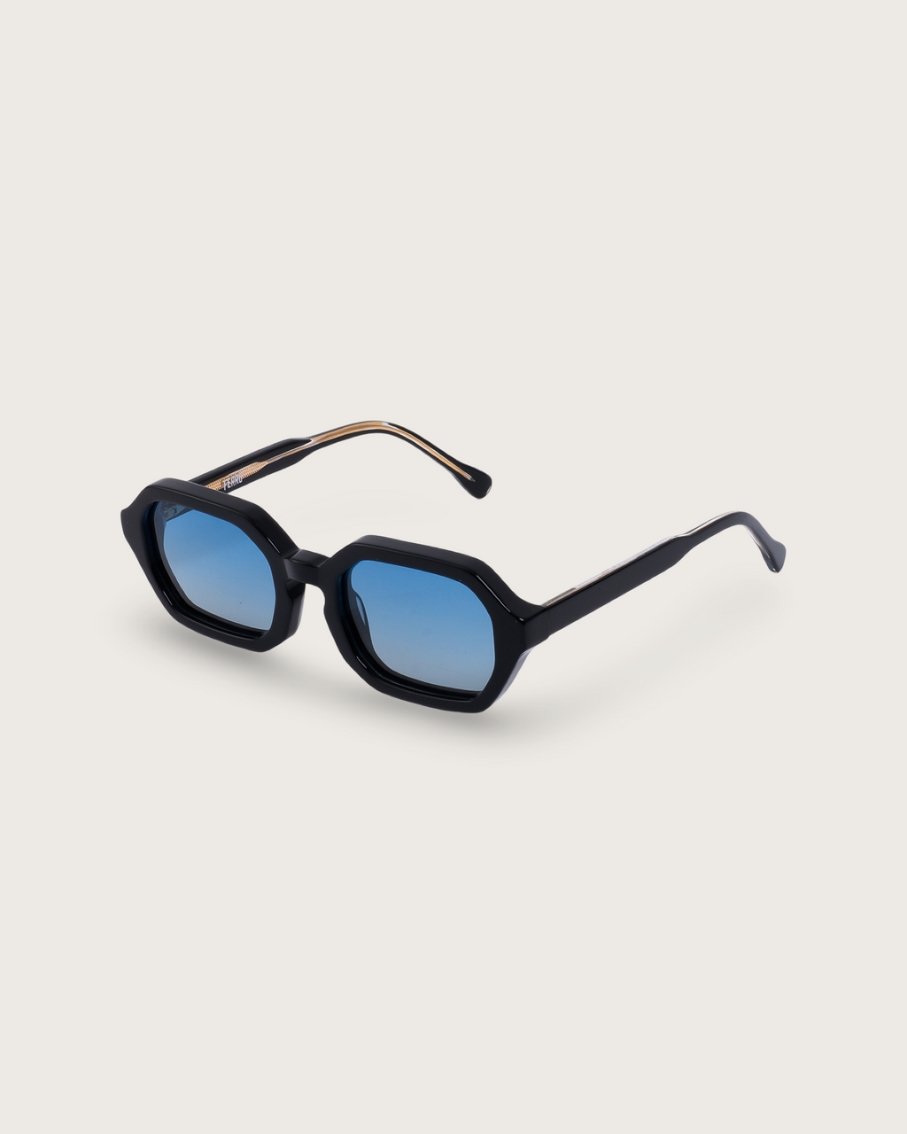 FERRO Midnight Blue Gradient sunglasses with a bold octagonal frame and blue gradient lenses, featuring gold detailing.