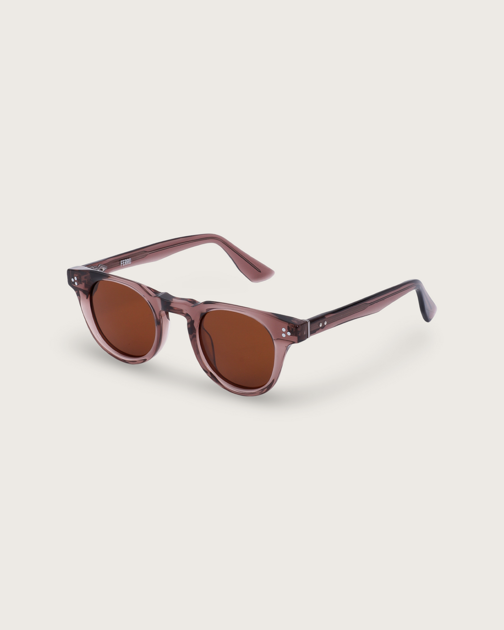 Aero Terra sunglasses in translucent brown acetate with bronze-tinted lenses, featuring FERRO detailing for sophisticated style.