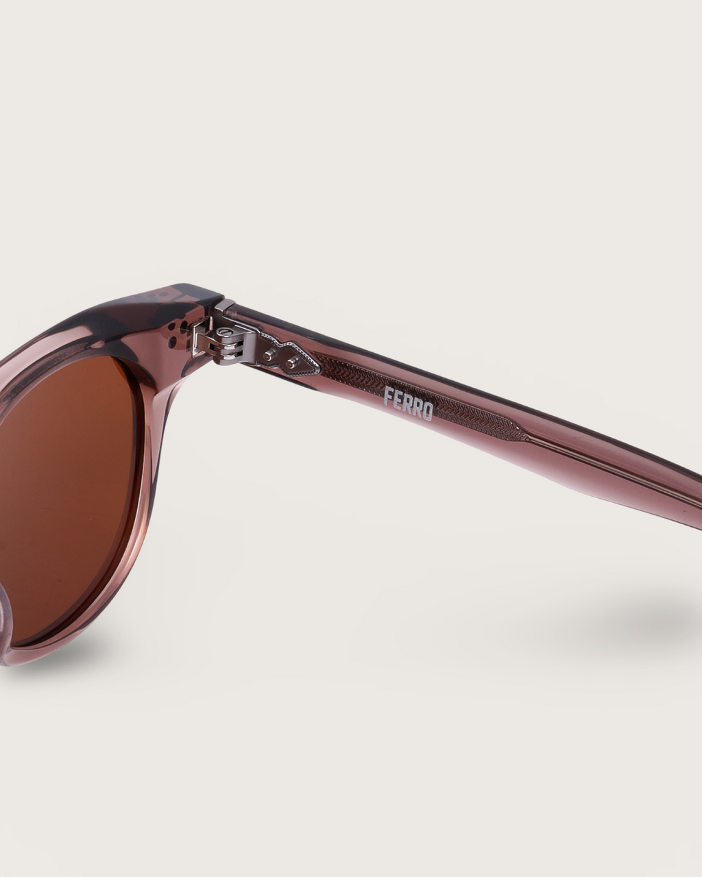Aero Terra sunglasses featuring brown acetate frame and bronze-tinted lenses, with FERRO engraved detailing.