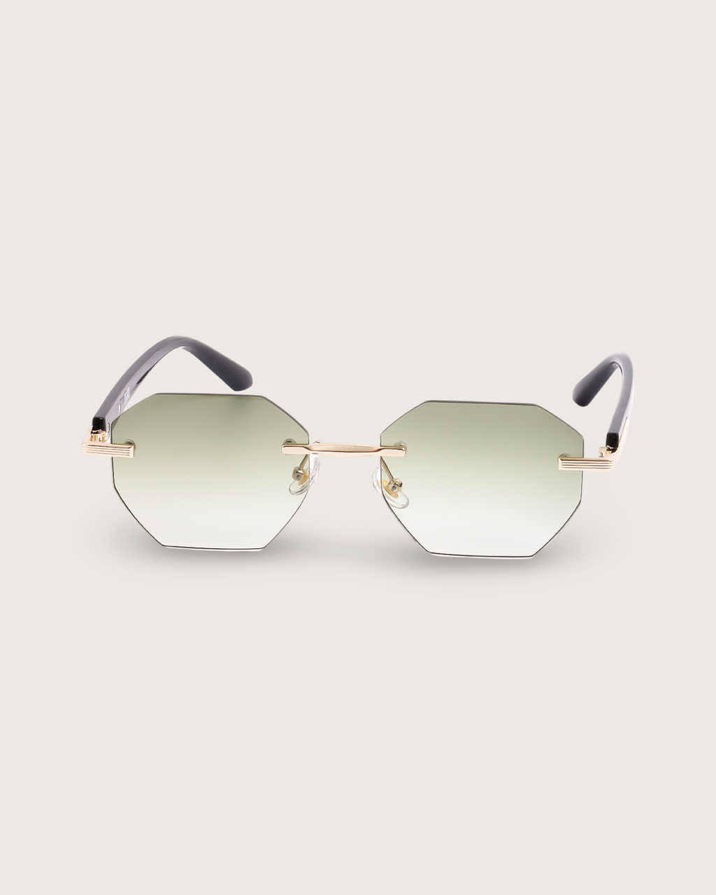 Vanta III sunglasses featuring hexagonal rimless design, green gradient polarized lenses, black acetate arms, and gold detailing.