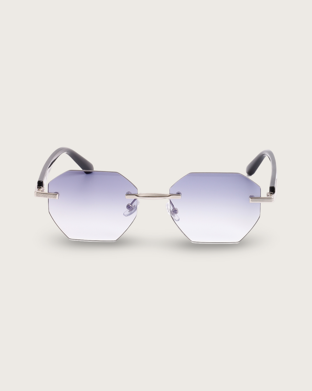Vanta II sunglasses featuring hexagonal rimless design, ice-blue gradient lenses, and sleek black acetate arms.