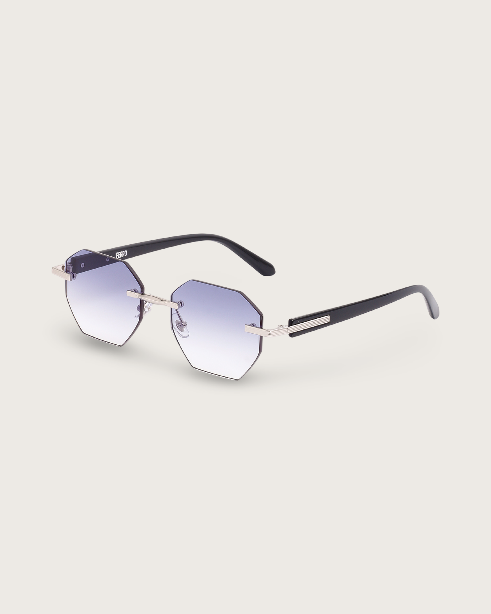 Vanta II sunglasses featuring ice-blue gradient lenses, hexagonal rimless design, and sleek black acetate arms.